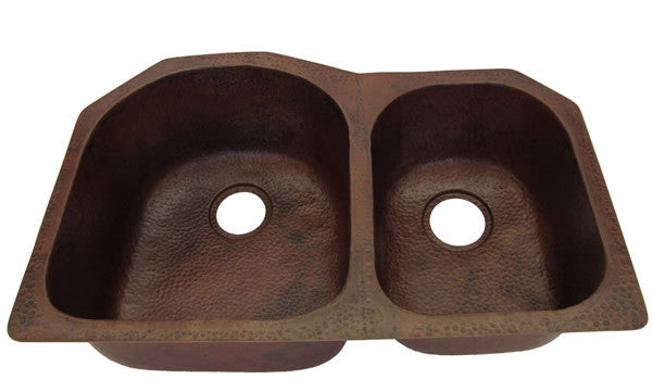 Hand-hammered double bowl copper kitchen sink with antique dark brown finish, perfect for luxury home accessories and farmhouse decor.
