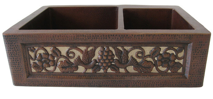 Hand-hammered double bowl copper kitchen sink with nickel apron design, luxury artisan copper home accessory.