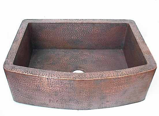 Farmhouse kitchen sink with round apron