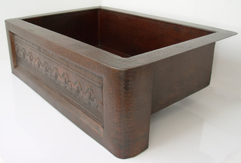 Hand-hammered copper farmhouse kitchen sink with embossed running horses design in dark brown finish.