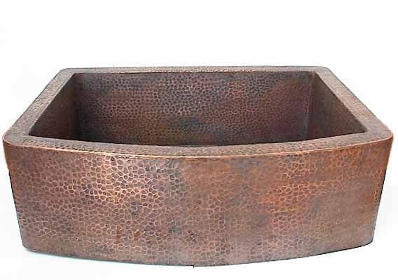 Farmhouse kitchen sink with round apron