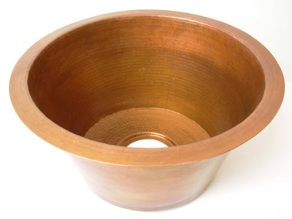 Round copper kitchen sink.