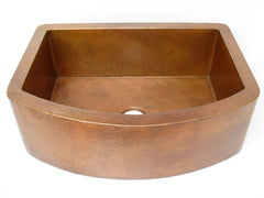 Farmhouse kitchen sink with round apron